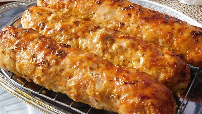 Grilled meatloaves on rack