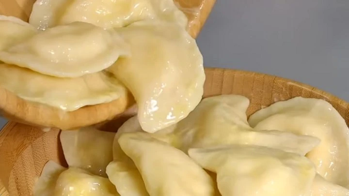 Dumplings in wooden bowl