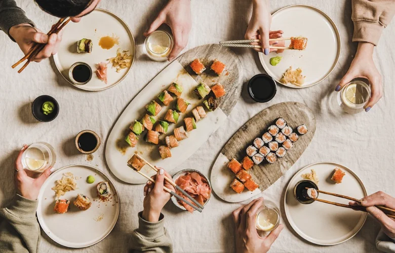 People eating sushi together