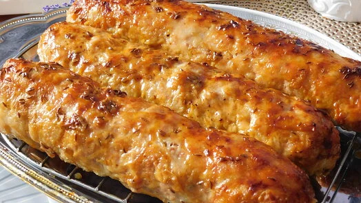 Baked meatloaves on rack