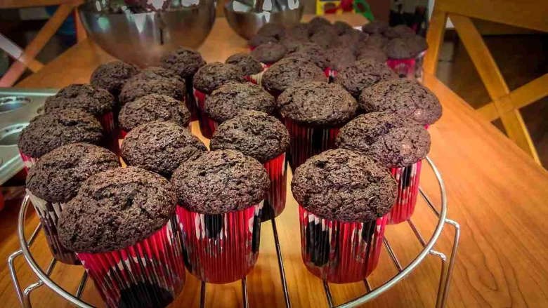 Chocolate muffins on rack