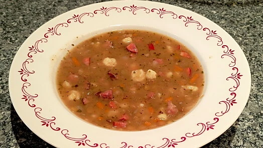 Hand soup in bowl