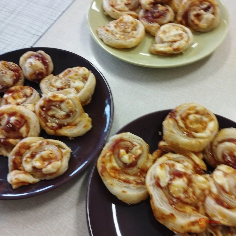 Savory pastry rolls with sauce