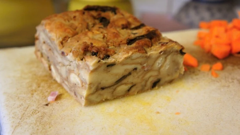 Sliced meatloaf with mushrooms