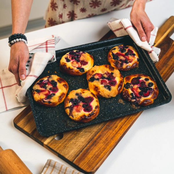 Baked berry pastries on tray
