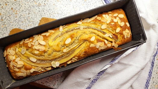 Banana bread loaf with almonds